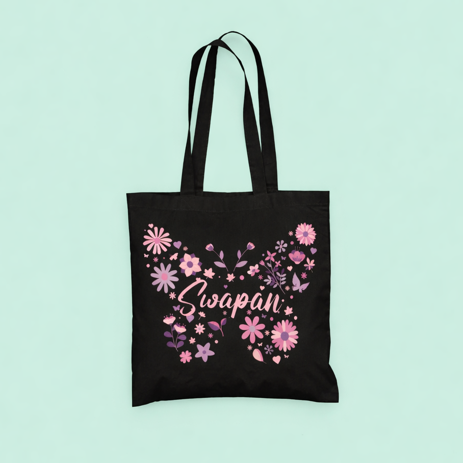 Black tote bag with pink floral design and 'Lipapan' text on a light blue background
